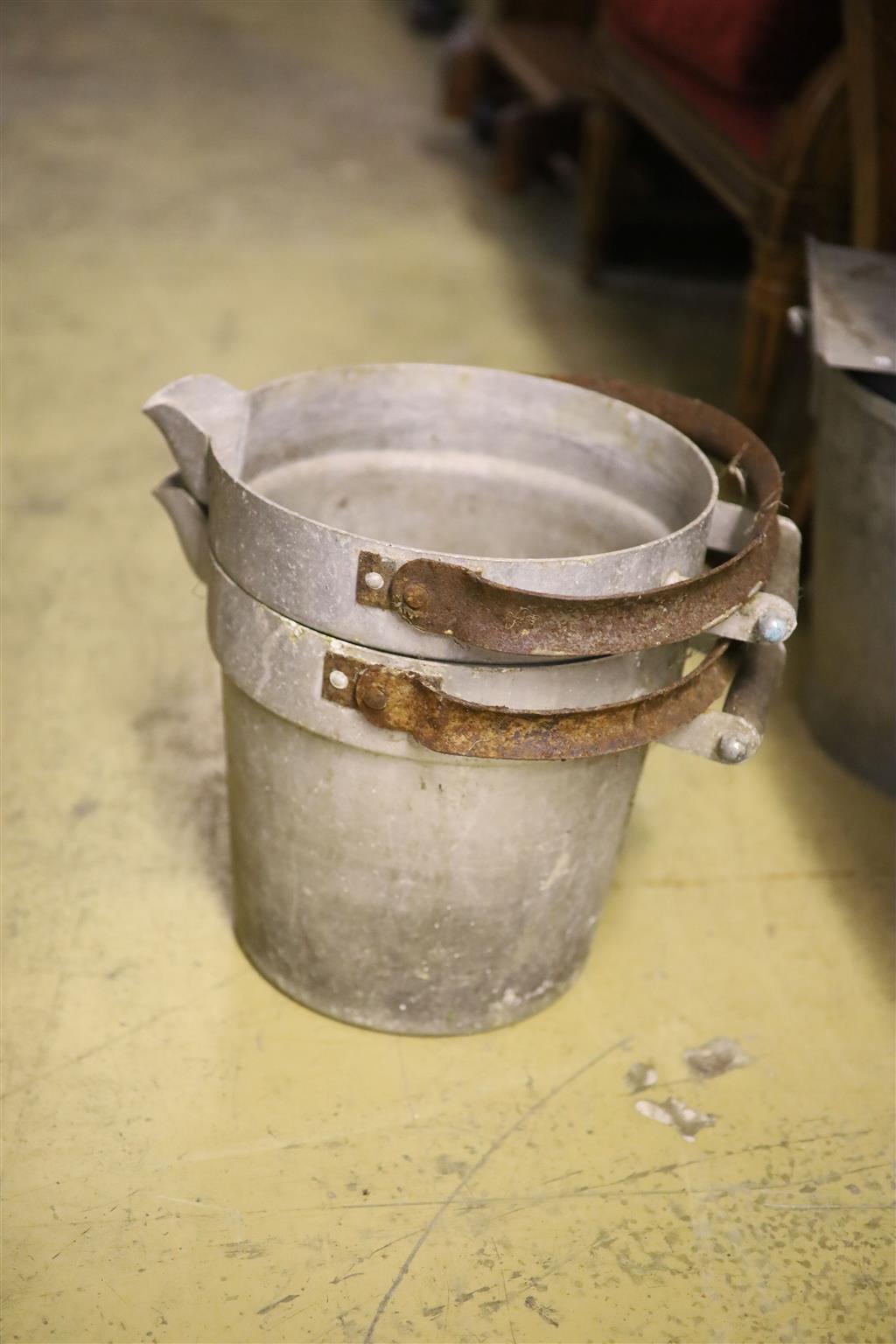 A quantity of galvanised buckets, feeders etc